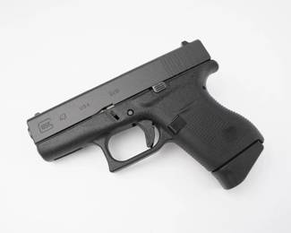 The already legendary G43 is a GLOCK Single stack, 9 mm Luger caliber pistol. It is ultra-concealable, accurate and a fantastic tool for all shooters regardless of one’s hand size. The grip has a built-in beaver tail design which allows the shooter to acquire a high and tight grip. The aggressive texture of the grip surface allows for comfortable and reliable operation of the pistol. The large magazine catch makes quick work of removing the six round magazine. Engineered based on the same superlative standards that GLOCK is famous for, the tiny G43 tolerates the same torture tests all its bigger brothers in the GLOCK pistol family withstand. This pistol is in excellent condition and shows little signs of use and wear. 