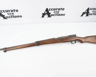 Condition: Excellent The Type 99 rifle was a bolt-action rifle of the Arisaka design used by the Imperial Japanese Army during World War II., 7.7mm Arisaka caliber, 25 5/8" barrel, blued finish, internal box magazine, "Mum" is intact, rear sight with aircraft wings, sling mounts. THis rifle is in excellent condition showing normal signs of use and wear. 