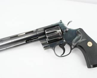 The Colt Python is a double action revolver chambered for the .357 Magnum cartridge. It was first introduced in 1955. This Colt was produced in 1971, SN E31172. Pythons have a reputation for accuracy, smooth trigger pull, and a tight cylinder lock-up. Pythons, built on Colt's large I-frame, are similar in size and function to the Colt Trooper and Colt Lawman revolvers. Has a colt medallion, pachmayr grip this revolver features a 6 inch barrel And is in Good condition showing signs of use and holster wear.