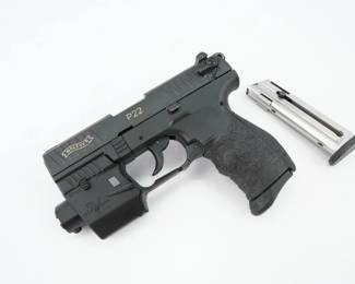 Serial # Z025801 Condition: Excellent The Walther P22 is a semi-automatic pistol chambered for .22 Long Rifle, Manufactured by Carl Walther GmbH Sportwaffen, it was introduced in 2002 and has become very popular among shooting sports. It is distributed by the American gun company Walther America, associated with Smith & Wesson. This pistol features viridian light, Which needs batteries, and 2 mags. This pistol is missing its front sight. This pistol is in good condition showing normal signs of use and wear. 