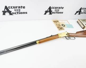 1966 was the Winchester Repeating Arms Company's 100th year of operation. To commemorate this occasion, Winchester produced a run of fancy Model 94 rifles. These were based on post 1964 Model 94's actions with a gold plated receiver and forend cap, brass "rifle" (curved) buttplate, saddle ring, and a heavy octagon barrel with a full length magazine that was nicely polished and deeply blued. The straight hand stock was selected walnut. All were in caliber .30-30 Winchester. There were rifle (26") and carbine (20") barrel lengths, and sets of rifle and carbine with consecutive serial numbers were also offered. Sister gun is lot 18007. The point to all of the gold and brass was to make the 1966 Centennial reminiscent of the brass framed Winchester 1866 "Yellow Boy" rifle that was Winchester's first product. This Rifle Comes with the original box and is in Excellent Condition showing normal signs of use and wear. 