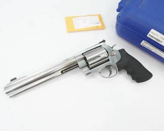 In 2003 the gunsmiths and engineers at Smith & Wesson wanted to deliver maximum power for serious handgun hunters. The power they sought required an entirely new frame, the massive "X-Frame™," and was the basis for the new Model S&W500, the most powerful production revolver in the world. This ushered in the era of the "big gun" and was only the beginning. For ultimate power and velocity there's nothing even close to an X-Frame model handgun. This revolver comes with the original case and is in excellent condition showing minimal signs of use and wear. 