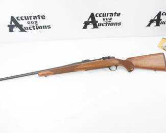 Serial # 710-51126 Condition: Excellent Country: Factory box 2 mags The Ruger M77 is a bolt-action rifle produced by Sturm, Ruger & Co. It was designed by Jim Sullivan during his three years with Ruger. It was designed primarily as a hunting rifle featuring a traditional Mauser K98-style two-lugged bolt with a claw extractor.This Rifle comes with the original box and is in excellent condition showing minimal signs of use and wear.