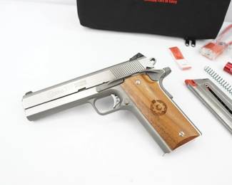 Serial # EKA3976 Condition: Excellent Evolved from a classic 1911 pistol by legendary gun designer Dan Coonan, the self loading Coonan .357 Magnum Automatic delivers the most impressive firepower the industry has to offer. Crafted from stainless steel, the Coonan .357 Magnum Automatic is manufactured to exact, close tolerance specifications for supreme accuracy, reliability and shooting comfort. It combines a crisp four pound trigger pull, low-profile sights and palm-filling grips that will help you deliver explosive firepower that can’t be explained using words or pictures alone. Everyone who shoots it agrees - you've never shot anything like a Coonan and you won't understand it until you do. This pistol comes with two mags and an original case. This pistol is in excellent condition showing normal signs of use and wear.