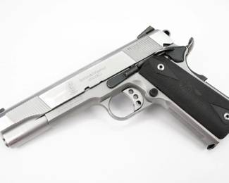 The SW1911 (Smith & Wesson) is a stainless steel framed, single action, semi-automatic pistol based on the M1911, coming in either 9×19mm or .45 ACP. This pistol, chambered in .45 ACP, is sold with one magazine and is in excellent condition, showing normal signs of use and wear. 