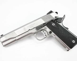Serial # JRJ0399 Condition: Excellent The SW1911 (Smith & Wesson) is a stainless steel framed, single action, semi-automatic pistol based on the M1911, coming in either 9×19mm or .45 ACP. This pistol, chambered in .45 ACP, is sold with one magazine and is in excellent condition, showing normal signs of use and wear. P