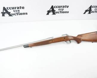 Serial # H301052 Condition: Excellent Country: W/ box SS bar The Savage Model 14/114 American Classic is a timeless representation of the gun makers art reflected in wood steel. The American Classic now features the detachable box magazine that offers a smooth straight line feed for more reliability every time and the revolutionary AccuTrigger. This rifle has a 22 inch stainless steel barrel and comes with the original box. This Rifle is in excellent condition showing normal signs of use .