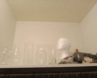Vases, wig head, back massager