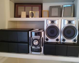 Stereo system with tons of CDs, frames