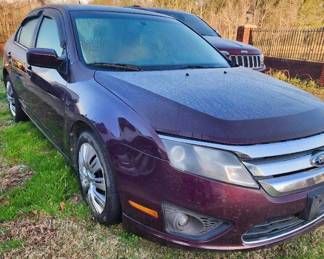 2012 Ford Fusion 4 door sedan Dark Cherry color