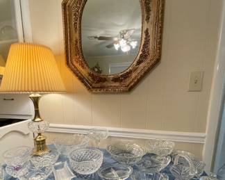 Lovely glassware for entertaining and dining. Elegant mirror