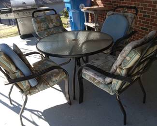 Round table with 4 chairs, gas grill