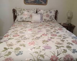 Queen wooden bed headboard and footboard with matching nighstand.