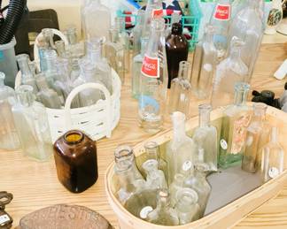 Bottles: coke, beer and medicine
