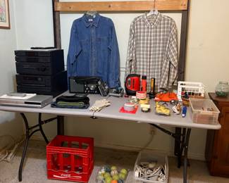 Bedrails, nice shirts, electronics, old Polaroid camera