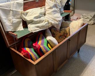 Mcm chest, various blankets, linens, pillows