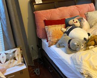 Sleigh queen bed from Ivan Smith with drawers on the sides and on the front with a sleep number mattress…