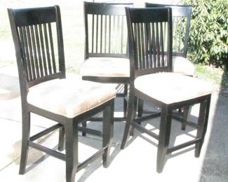 4 chairs, the seats are a light brown