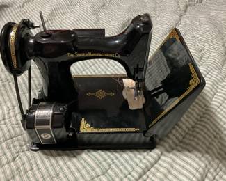 The Singer Manufacturing Co Featherweight Sewing Machine 