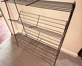 Vintage black MCM metal book rack