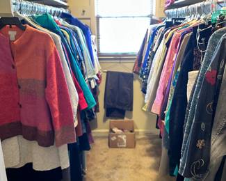 Closets full of elegant designer clothes