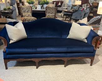 1920'S Baker Camelback Sofa with Chinoisere carvingins on arms and legs. Reupholstered in Pindler Fabric