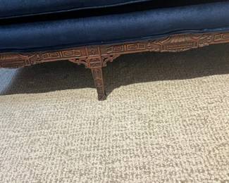 Carvings along base and legs