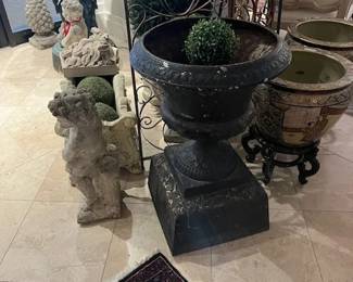 Four large cast iron vintage urns