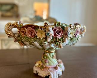 Footed compote with putti, made in Italy