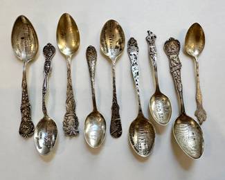 Sterling silver souvenir spoons, including many from Texas, California missions, and other Western U.S. sites