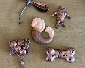 A few examples from an extremely large collection of brooches
