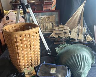 telescope, basket, old fishing items, camera bag, cast iron fountain, new orleans artwork, ships