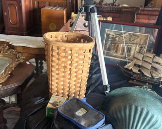 telescope, handmade basket cast iron wall fountain, camera bag, ships, artwork and furniture