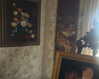 artwork hanging on wall in parlor