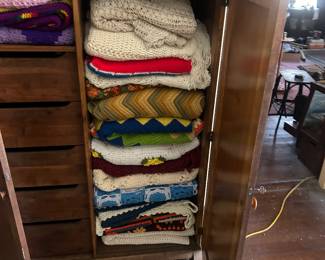 linen press with linens vintage