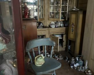 view of kitchen cabinets full of glassware
