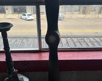 airplane prop made into a clock and candlesticks