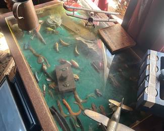 old fishing items in antique case