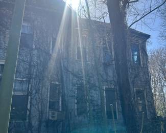 side view of house in sunshine