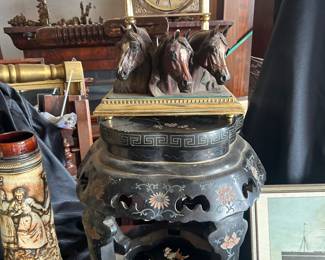 bronze horse heads, pedestal Asian, steins, clocks, and artwork