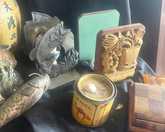 bookends, silver fish, camel tins and fish decor items