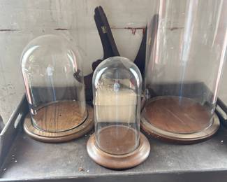 several glass domes with wooden bases, dozens of easels, 2 pc vintage serving table and thousands of other pieces