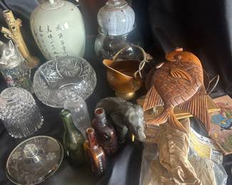 grouping of some of the thousands of items of glassware and figurines to be sold in this three day event