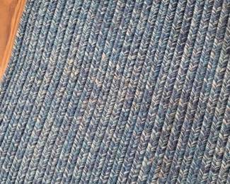 Blue woven area rug