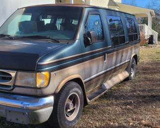 Econoline 150 d'Elegant van, doesn't run and doesn't have current inspection.  Title will convey