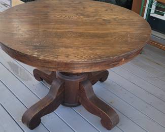 #15 Round Oak pedestal dining table 