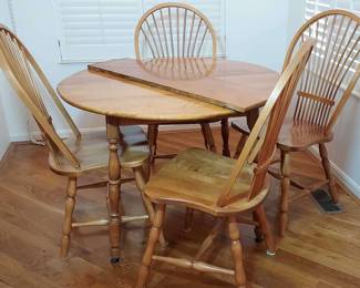 Expanding Dining Table with Wheat Back Chairs