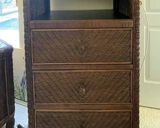 $130 - Swivel top dark wicker dresser. Dimensions: 31" x 18" x 45"