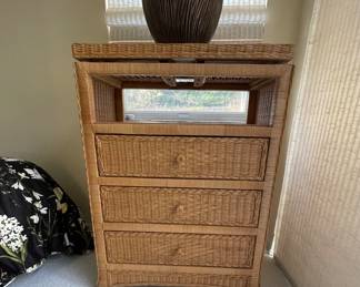 $130 - Light wicker swivel top dresser. Dimensions: 31.5" x 17" x 44"