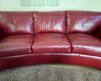 $550 - Red leather sofa. LIKE NEW! Dimensions: 86" x 37" x 35"